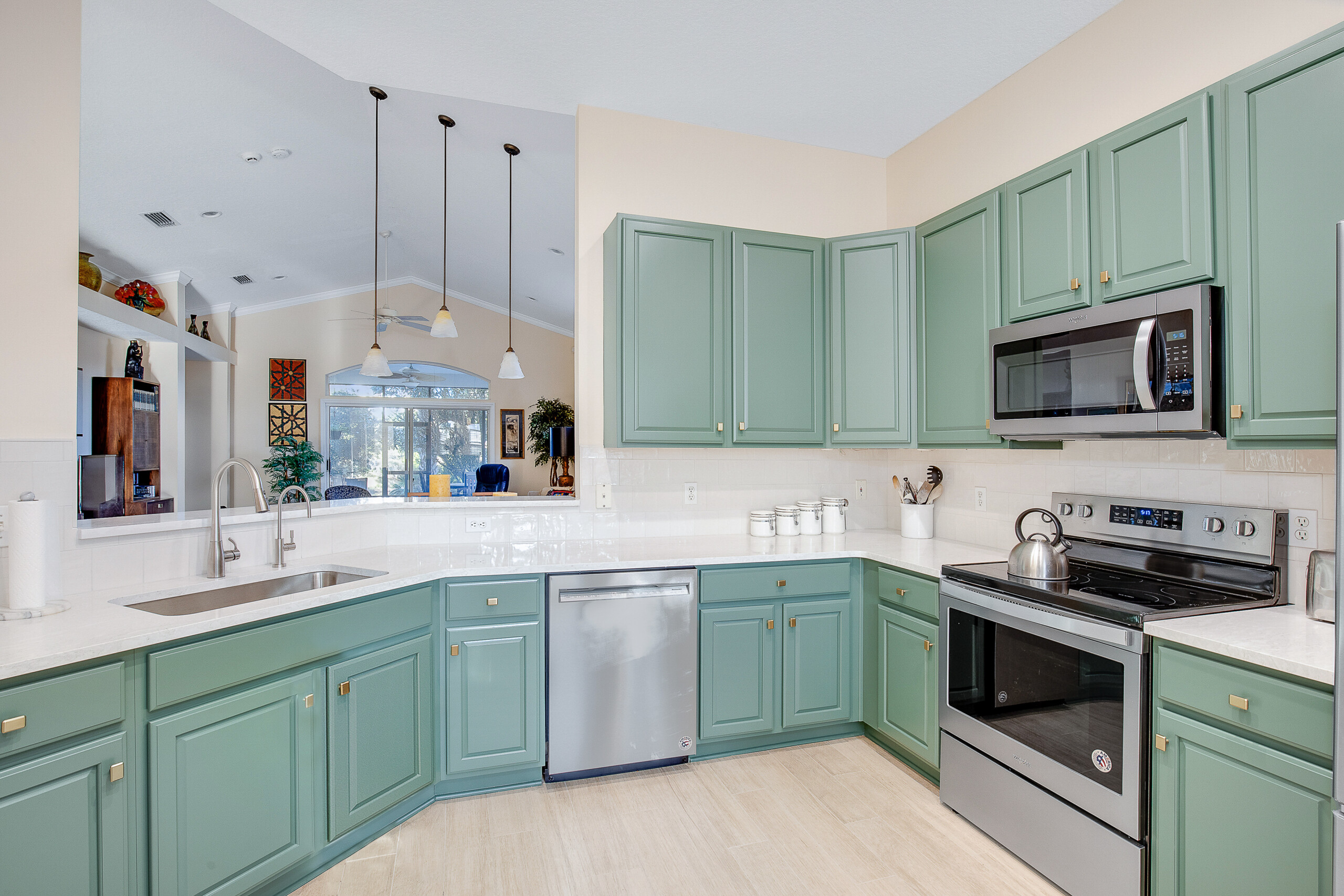 teal painted kitchen cabinets